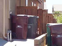 Improperly stowed trash containers.